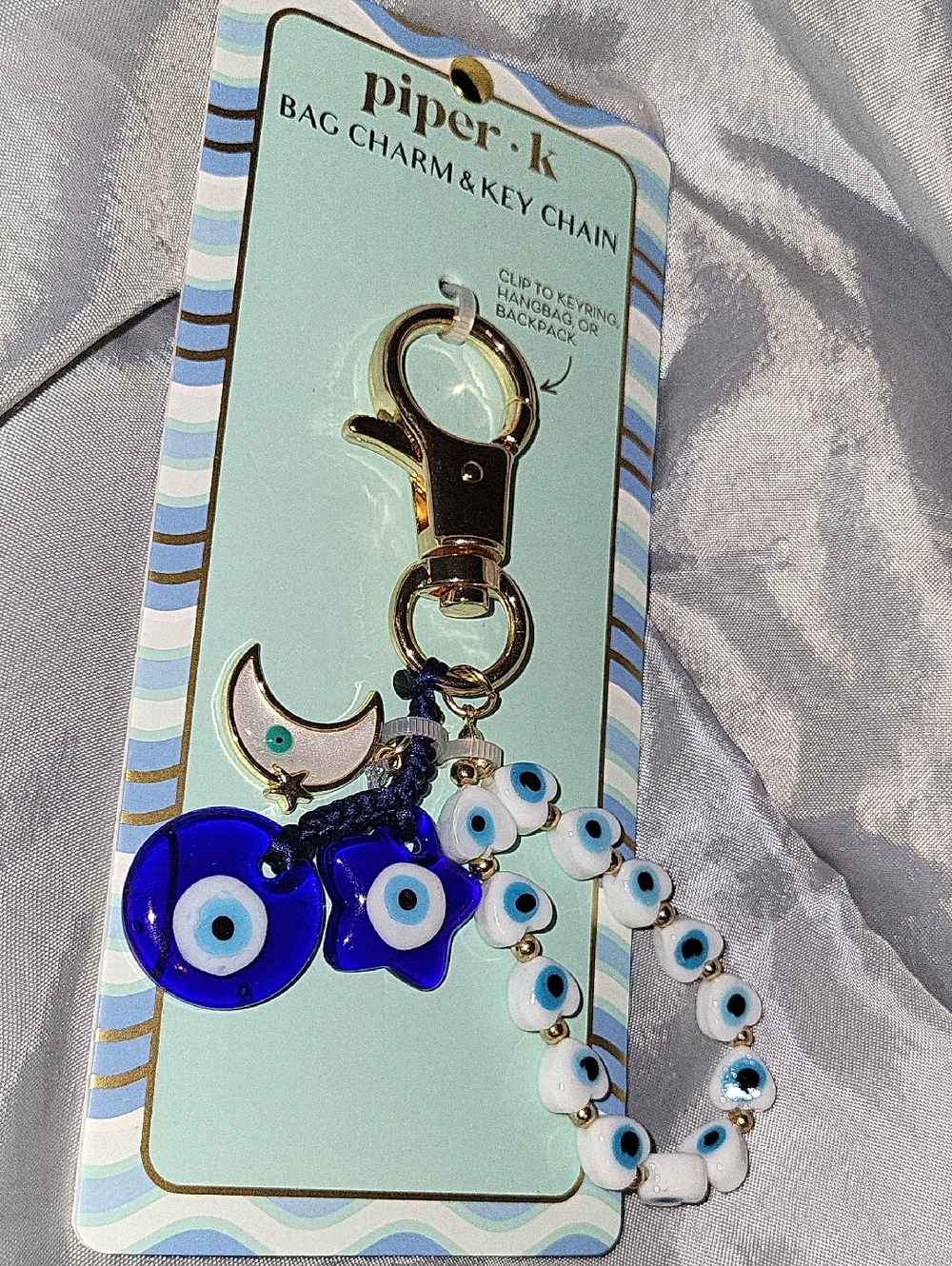 piper K Gold Keychain Bag Charm with Blue Evil Eye Accents Moon Star Ta